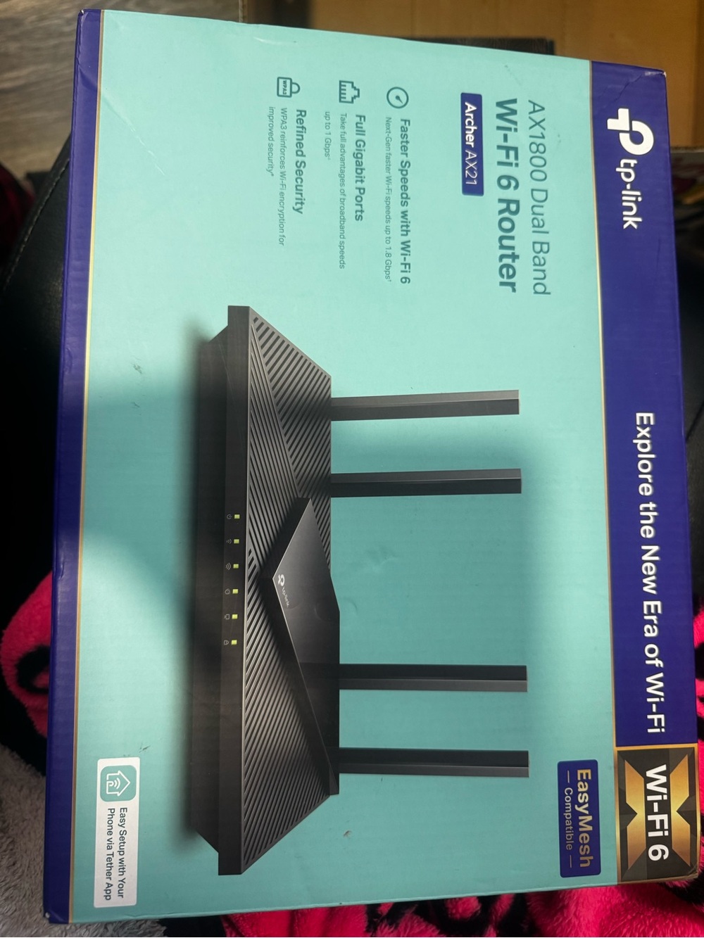TP-Link Archer AX21 Wi‑Fi 6 Router in Black and Teal Packaging